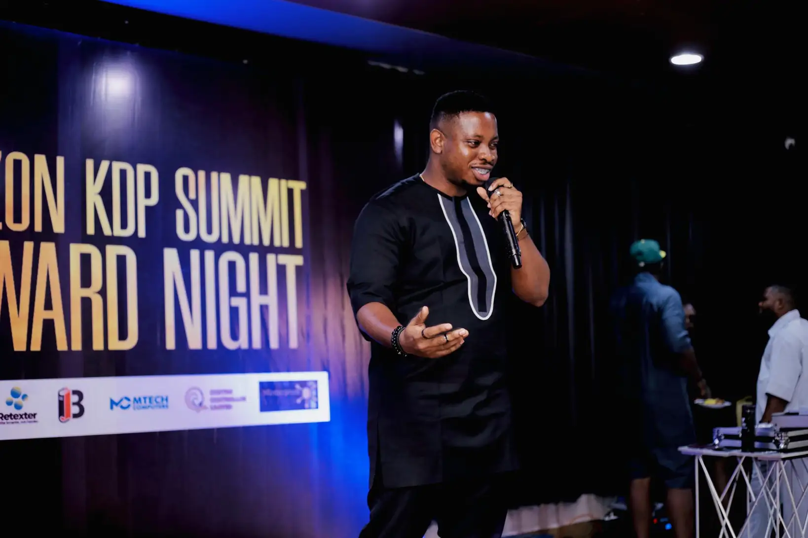 Bruno speaking at an event